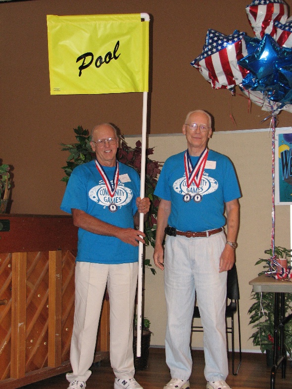 Seniors holding a flag